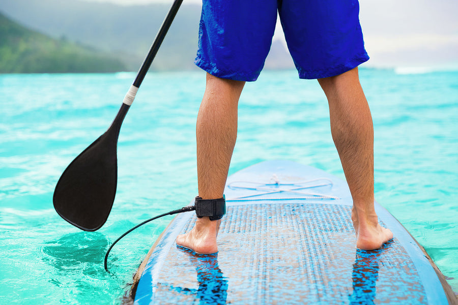 Image of a person paddleboarding