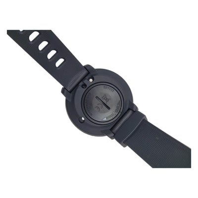 Black dive computer watch with a strap on a white background