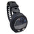 Black diving computer watch with digital display on a white background